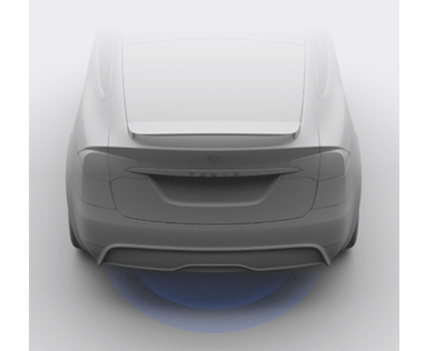 Zadní část vozu s vyzařujícími modrými čarami