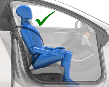 Person sitting in car seat correctly: shoulder and back against the seat, feet on the floor, seat belt on