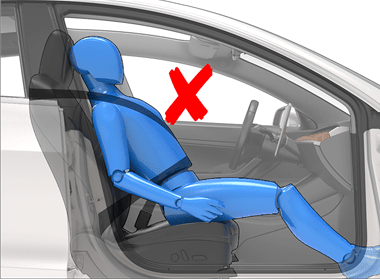 a person sitting on the edge of the seat and a red x