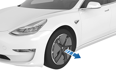 Wheel cover with arrow pointing away from tire