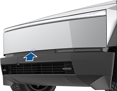 Parte delantera del Cybertruck con una flecha que apunta hacia el botón de apertura del maletero delantero