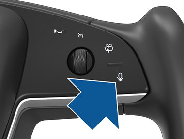 Arrow pointing to the microphone button.