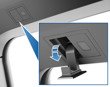 Situación de las perchas con una flecha que muestra que se despliegan hacia abajo.