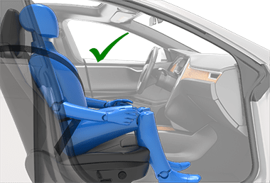 Person sitting in car seat correctly: shoulder and back against the seat, feet on the floor, seat belt on