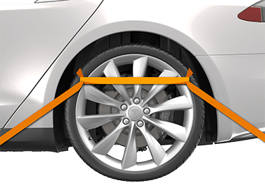 View of the rear wheel with tie-down straps installed.