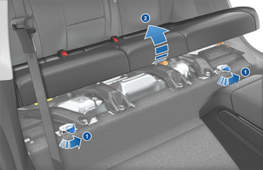 Image of rear seats with arrows. #1 shows pushing tabs to the left, #2 shows the seat being lifted up