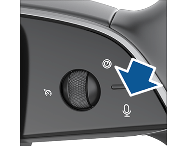 Freccia rivolta verso il pulsante del microfono.