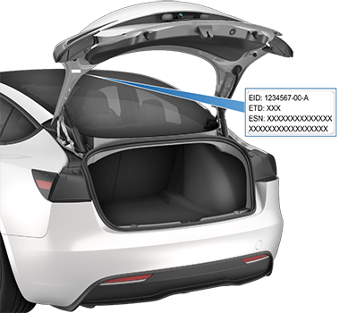 Rear trunk open with an arrow pointing to label on liftgate