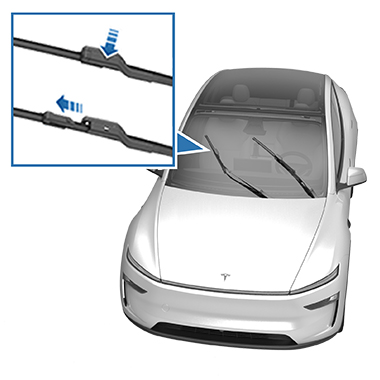 Zoomfelt af viskerbladet med en pil, der peger hen mod tappen og en anden pil, der angiver, at de skal trækkes fra hinanden