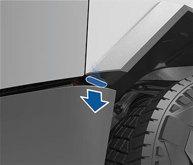 Parte delantera del vehículo con una flecha que muestra cómo retirar la cubierta del terminal de acceso del maletero delantero.