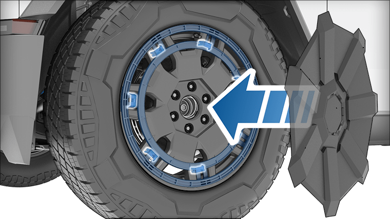 The wheel cover with an arrow pointing inwards toward the wheel