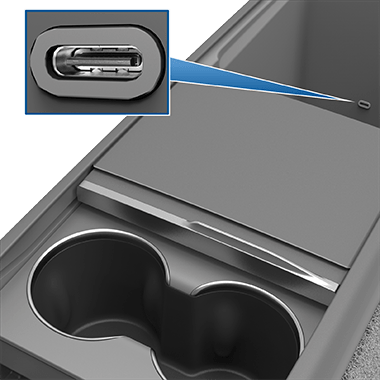 Front console with front compartment open, revealing two USB ports on rear wall of compartment